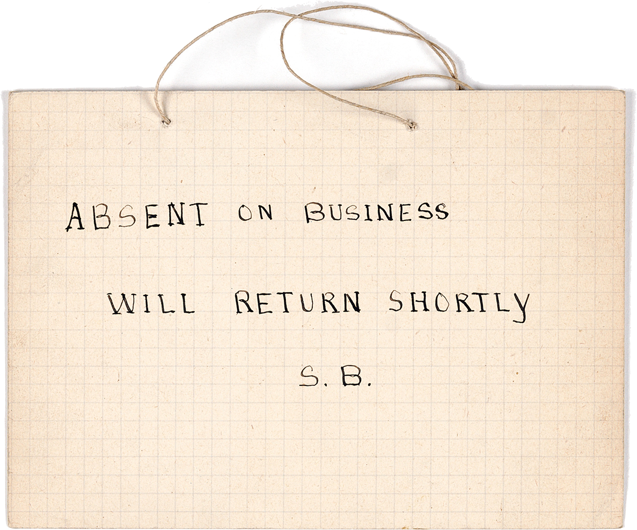 beach notecard reading 'absent on business, will return shortly'